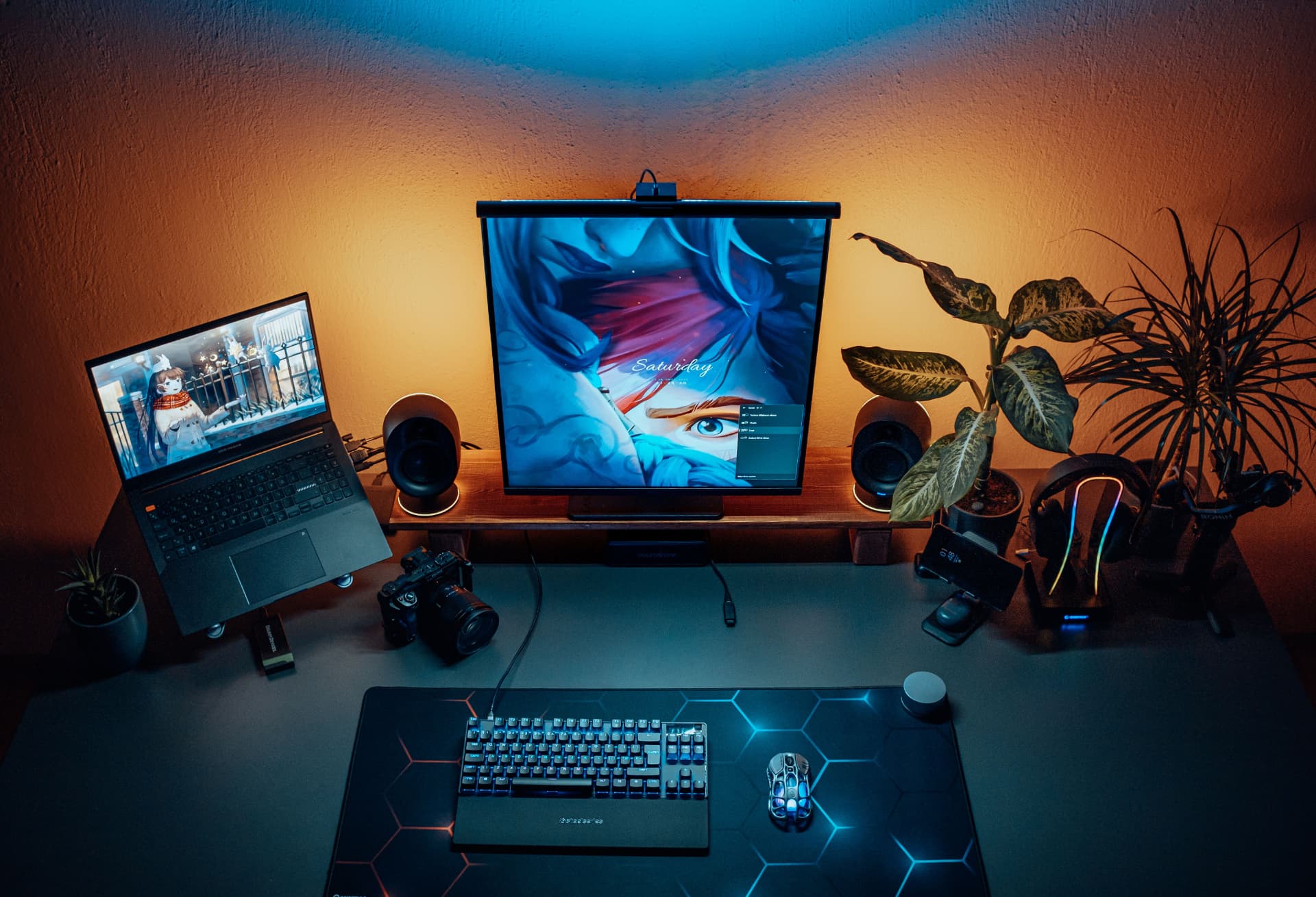Desk setup with monitor and ambient lighting representing always-on hosting